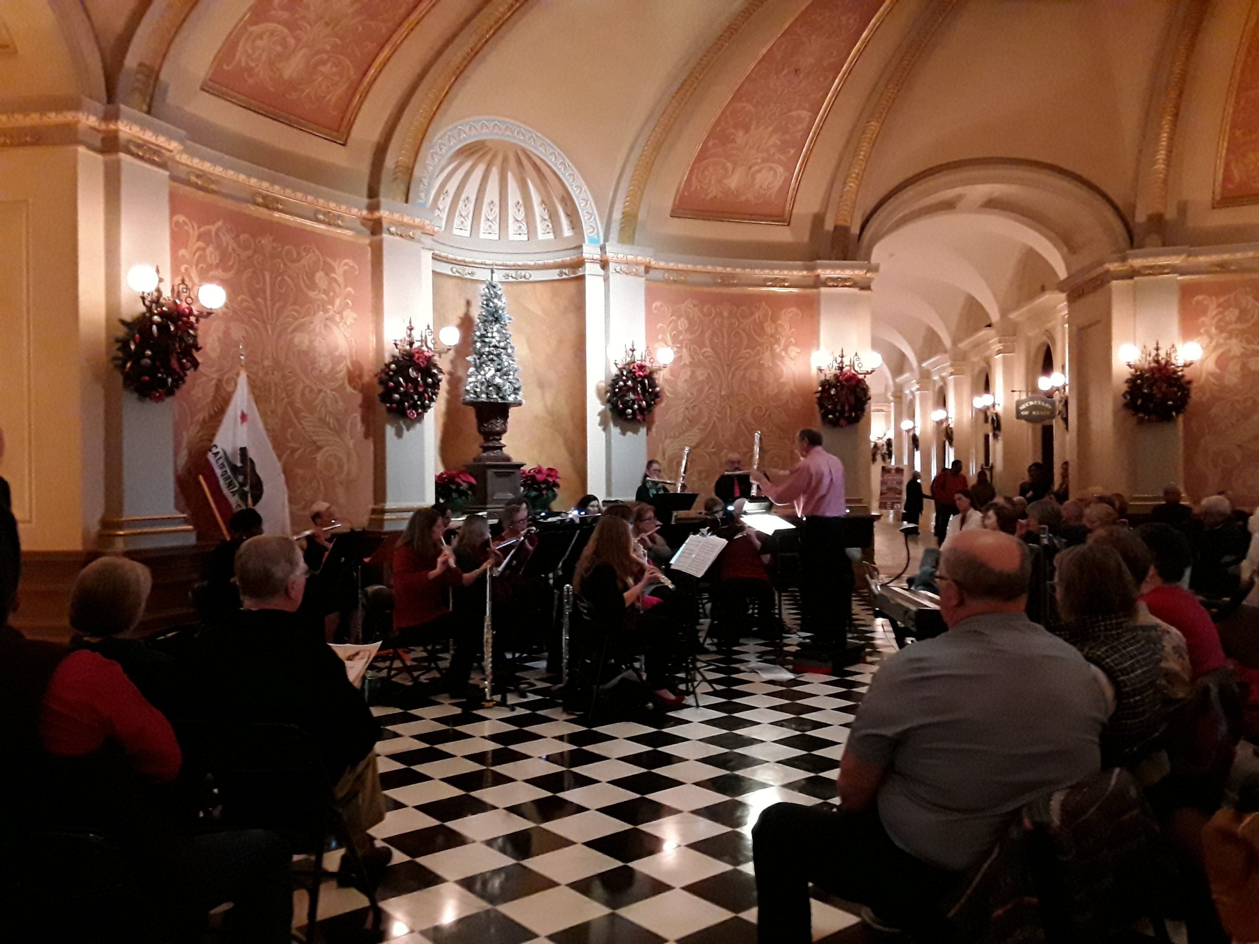 Musicians playing holiday music during Decembers Holiday Music Program