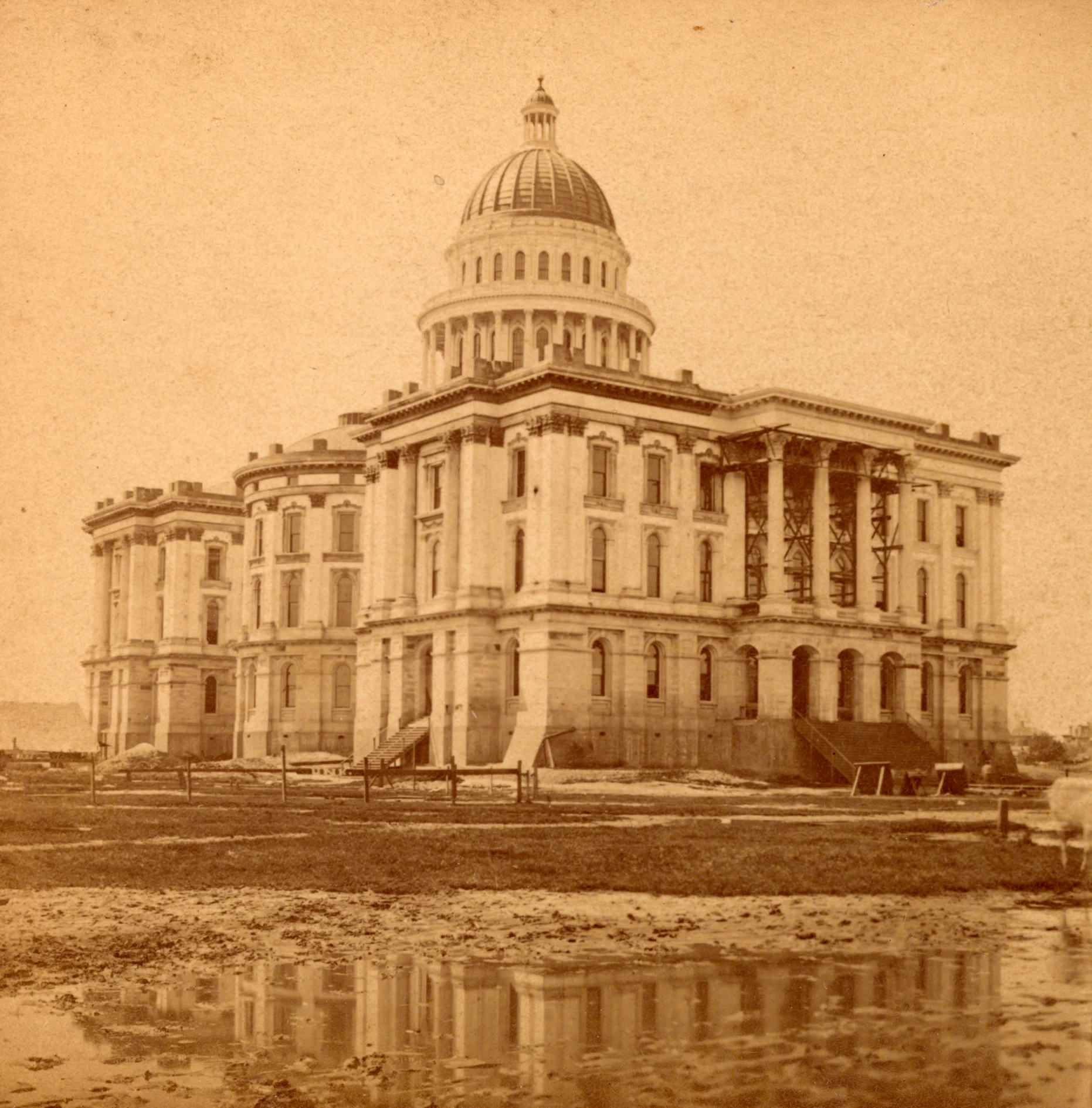 In progress construction of the California State Capitol building in the 1860s. In progress construction of the California State Capitol building in the 1860s.