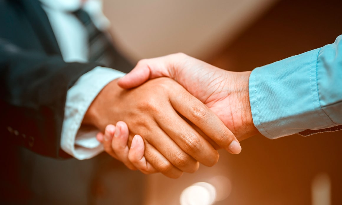 Two hands in a handshake