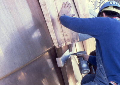 Applying metal sheeting to dome