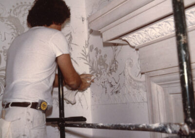 Artist Michael Casey applying plasterwork designs