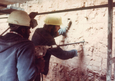 Drilling into brickwork in the Capitol late 1970s