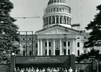 Members of the restoration team in front of the Capitol