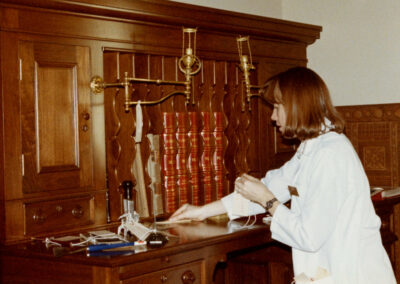 Museum staff placing historic objects