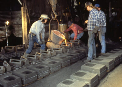 Pouring iron into casts