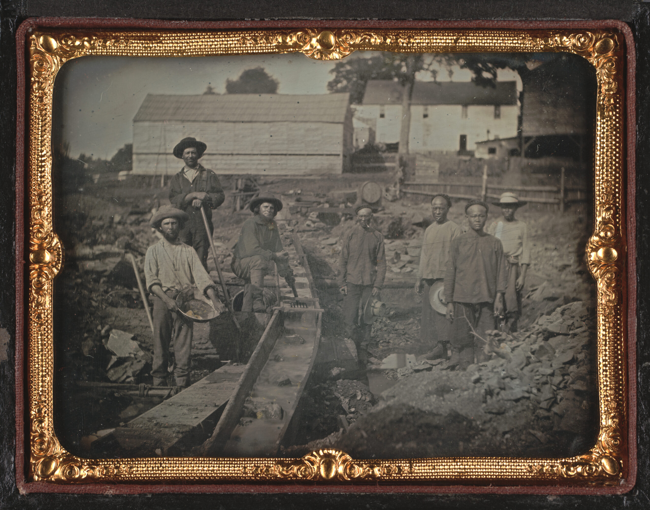 Miners using a sluice box at Auburn Ravine in Placer County, c. 1852. Miners using a sluice box at Auburn Ravine in Placer County, c. 1852.