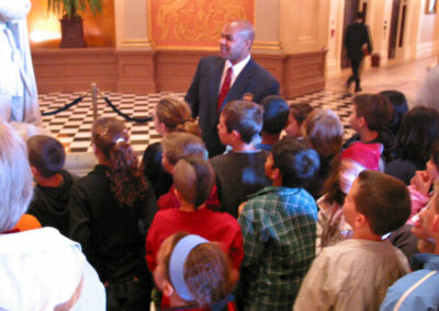 Tour guide with school group 2003