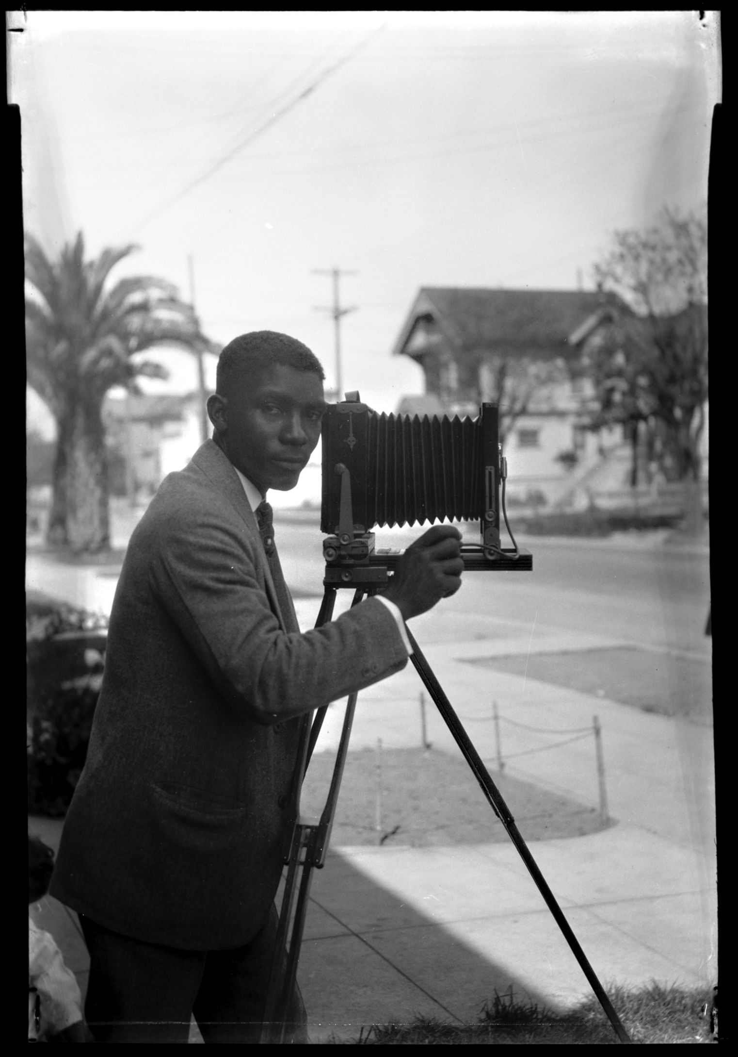 Portrait of EF Joseph with a camera, c. 1930 Portrait of E.F. Joseph with a camera, c. 1930. African American Museum and Library at Oakland, Oakland Public Library