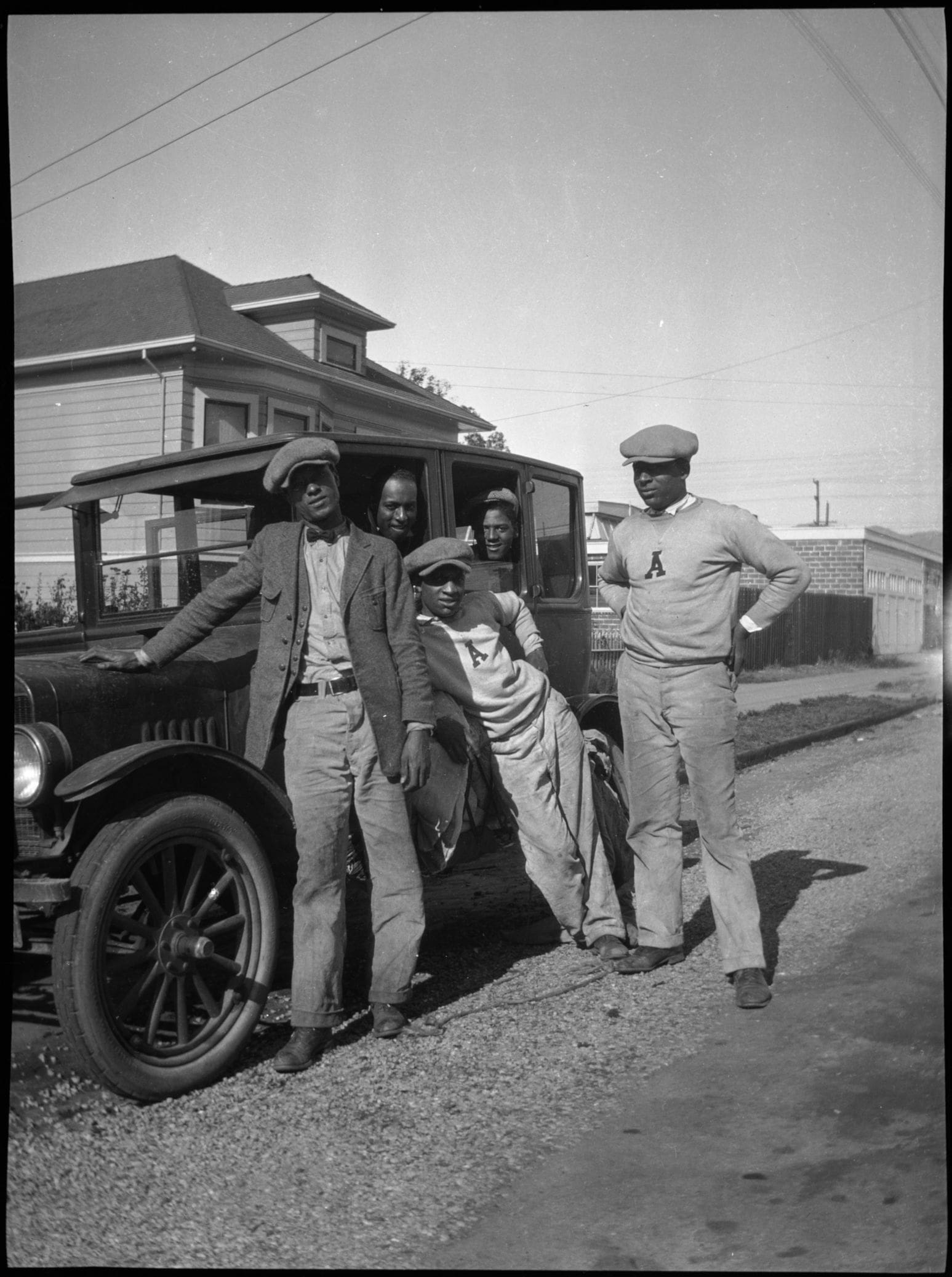 Five men and an automobile, Photo courtesy of the African American Museum and Library at Oakland, Oakland Public Library Five men and an automobile, c. 1920. African American Museum and Library at Oakland, Oakland Public Library